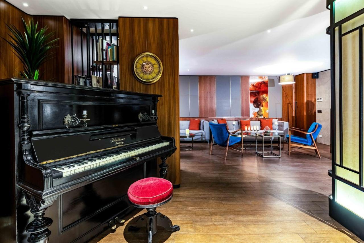 Tzl Suites Hotel Nisantasi Stambuł Zewnętrze zdjęcie The piano in the lounge
